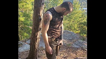 Hairy Tattooed Stud Jerking Off In The Woods.