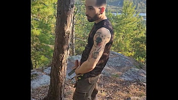 Hairy Tattooed Stud Jerking Off In The Woods.